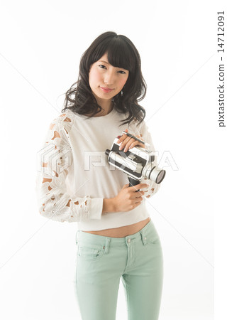 A woman with an 8 mm film camera 14712091