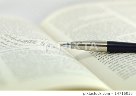 Opening textbook on white background Opening textbook on white background 14716033