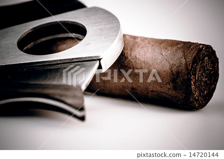 Cigar and cutter on a white background Cigar and cutter on a white background 14720144