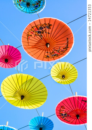 Sky decorated with colored umbrellas Sky decorated with colored umbrellas 14721353