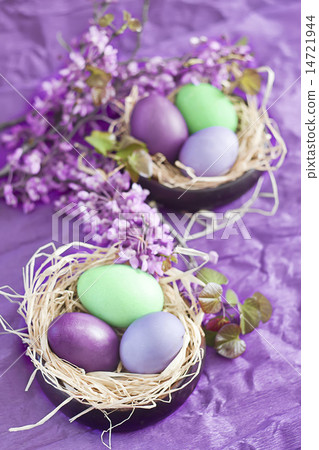 Colored easter eggs in nests Colored easter eggs in nests 14721944