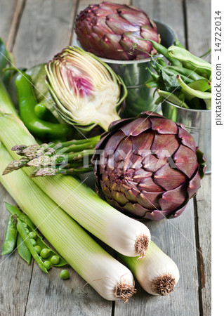 Mix of green vegetables on old wood background 14722014