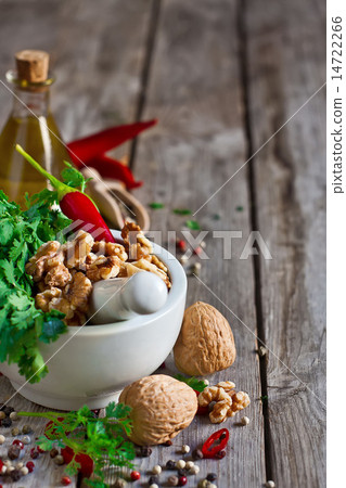Cilantro and walnuts in a mortar 14722266