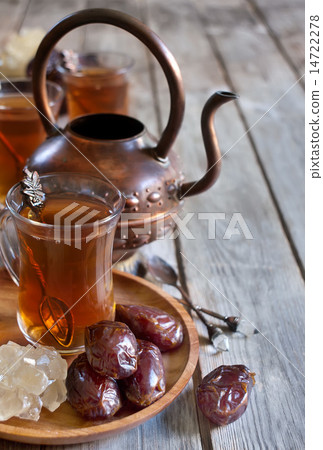 Arabic tea and dates background 14722278