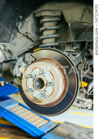 Close up of disk brake on car in process  14723433