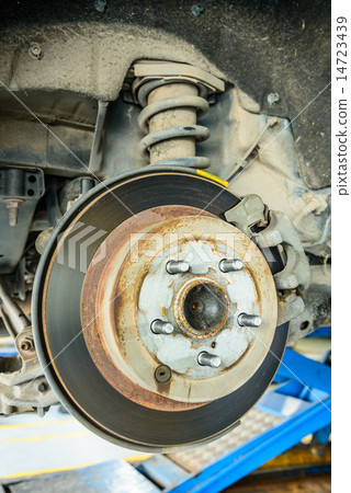 Close up of disk brake on car in process  14723439