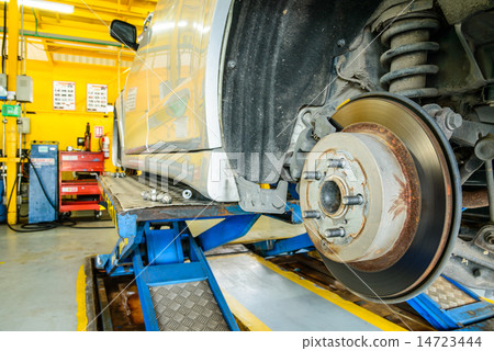 Close up of disk brake on car in process  14723444
