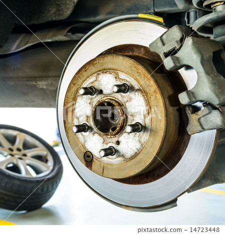 Close up of disk brake on car in process  14723448