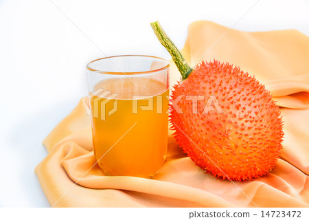 Gac fruit and juice isolated on white. 14723472