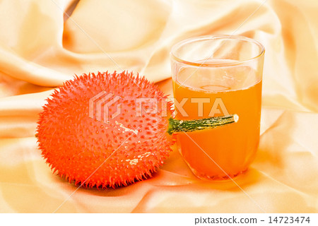 Gac fruit and juice isolated on white. Gac fruit and juice isolated on white. 14723474