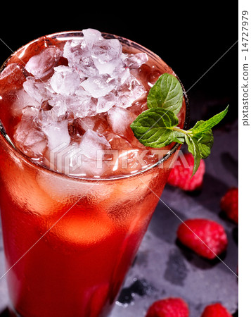 Red cocktail and mint on dark background. Red cocktail and mint on dark background. 14727979
