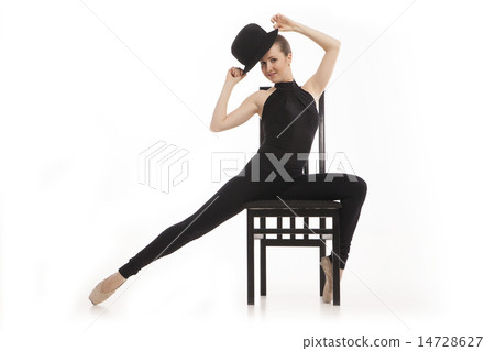 Pretty young ballerina sitting on the chair. Isolated Pretty young ballerina sitting on the chair. Isolated 14728627