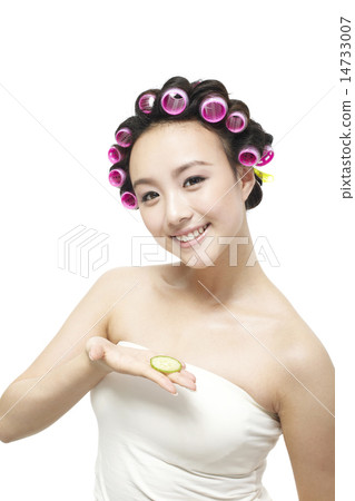 A woman wearing a perm A woman wearing a perm 14733007