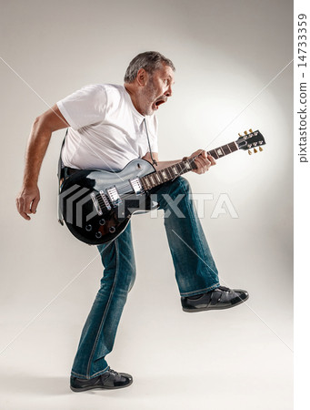 Full length portrait of a guitar player  14733359