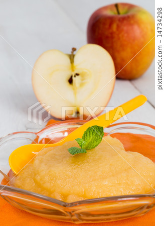 Applesauce with cinnamon and orange spoon 14734298