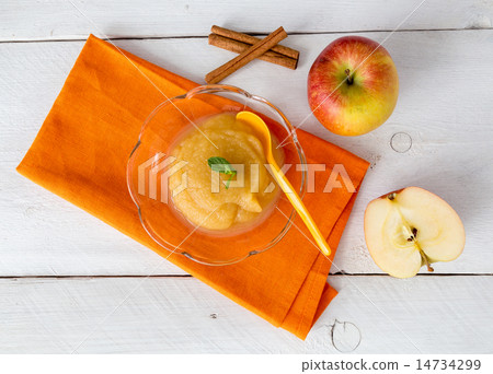 Applesauce with cinnamon and orange spoon 14734299