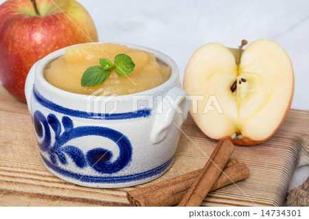 Applesauce with cinnamon in stoneware bowl 14734301