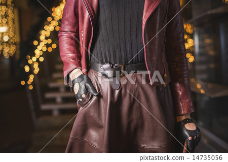 Woman with leather belt and gloves fashion look Woman with leather belt and gloves fashion look 14735056