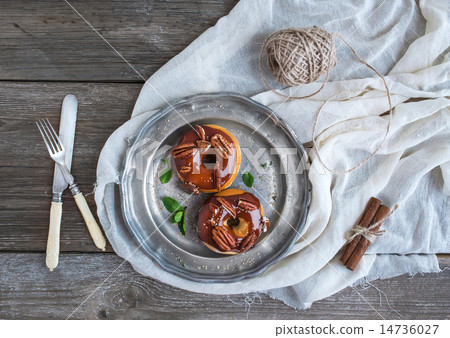 Cinnamon donuts with caramel icing 14736027