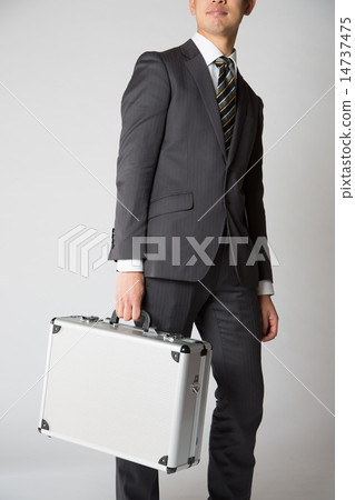 Business male notebook going out business trip outside Business male notebook going out business trip outside 14737475