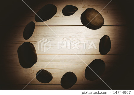 Pebbles laid out on table Pebbles laid out on table 14744907