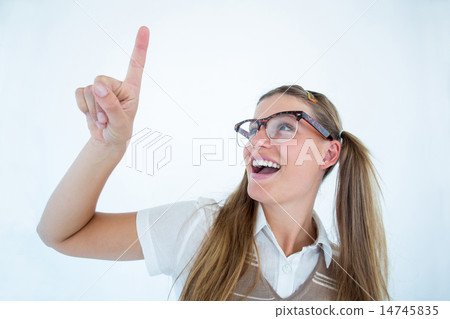 Happy geeky hipster pointing 14745835