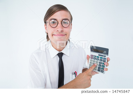 Geeky smiling businessman showing calculator Geeky smiling businessman showing calculator 14745847