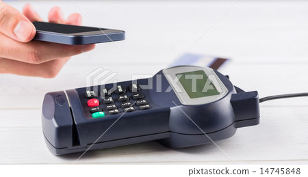 Man using smartphone to express pay Man using smartphone to express pay 14745848