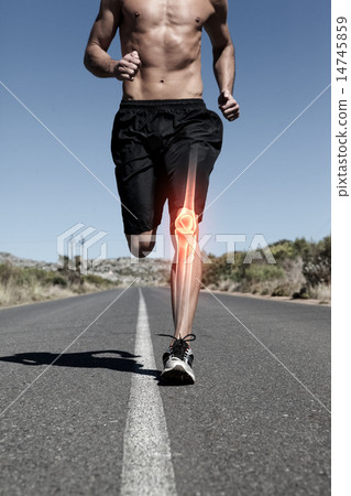 Highlighted knee bone of running man 14745859