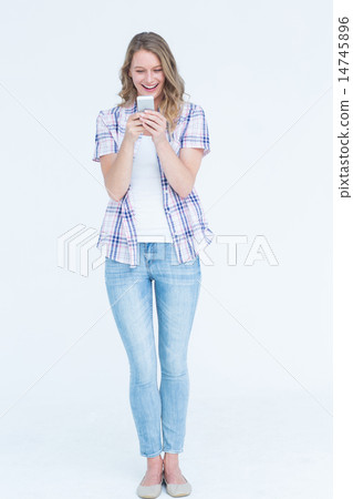 Pretty hipster using her smartphone 14745896