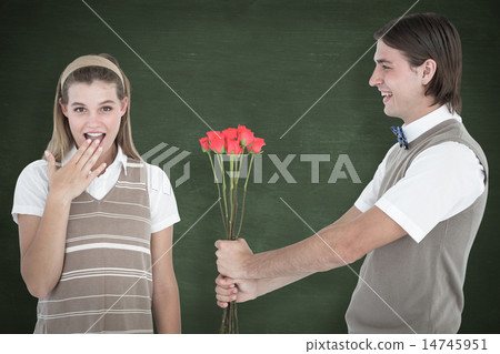 Composite image of geeky hipster offering red roses to his girlf 14745951