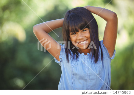 Cute little girl in the park Cute little girl in the park 14745963