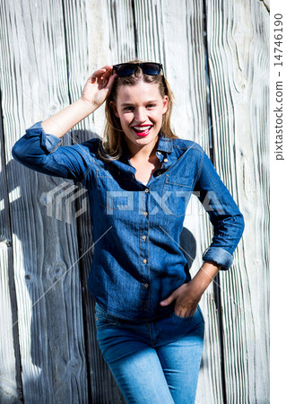 Pretty woman with hand in pocket 14746190