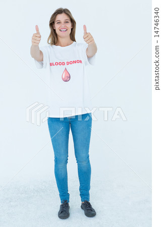 Blood donor showing thumbs up 14746340