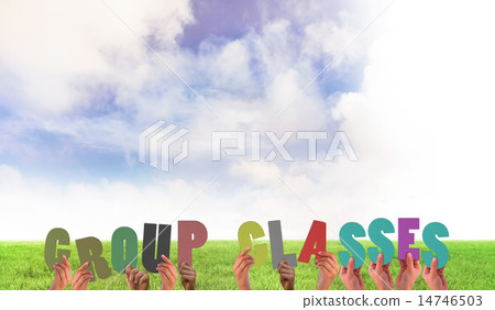 Composite image of hands holding up group classes Composite image of hands holding up group classes 14746503