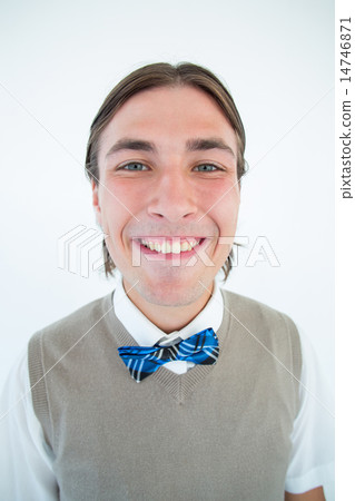 Geeky hipster smiling at camera and showing teeth 14746871
