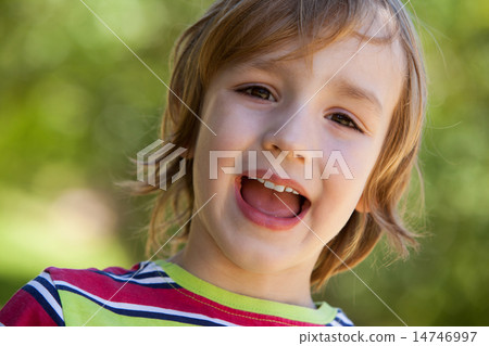 Happy little boy in the park Happy little boy in the park 14746997