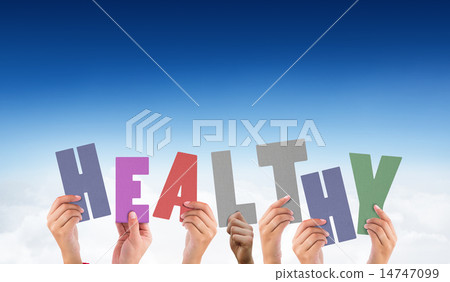 Composite image of hands holding up healthy Composite image of hands holding up healthy 14747099