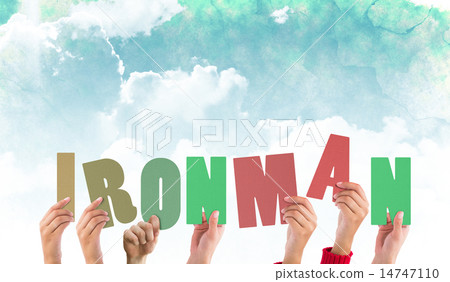 Composite image of hands holding up ironman Composite image of hands holding up ironman 14747110