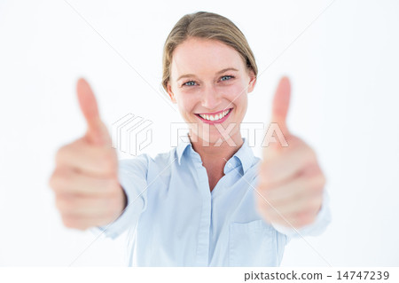 Smiling businesswoman looking at camera 14747239