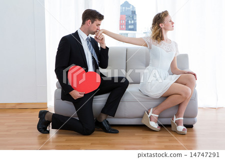 Businessman kissing his girlfriend hand Businessman kissing his girlfriend hand 14747291