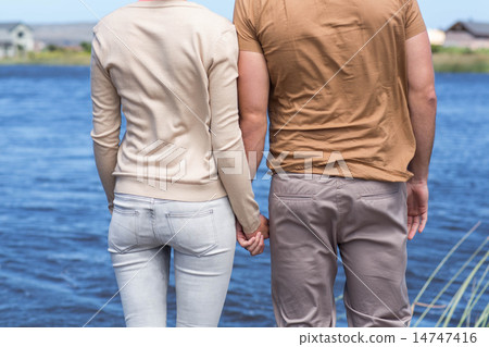 Happy couple at a lake Happy couple at a lake 14747416
