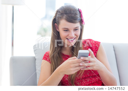 Pretty hipster using her smartphone 14747552