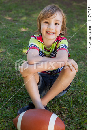 Little boy with american football Little boy with american football 14747974