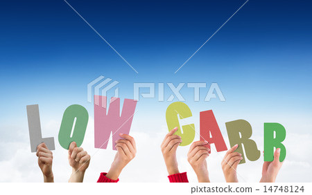 Composite image of hands holding up low carb 14748124