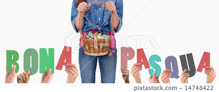 Composite image of hands holding up bona pasqua Composite image of hands holding up bona pasqua 14748422