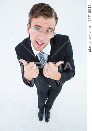 Geeky businessman with thumbs up 14748616