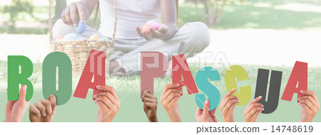 Composite image of hands holding up boa pasqua 14748619
