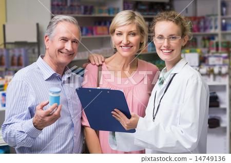 Pharmacist smiling at camera Pharmacist smiling at camera 14749136