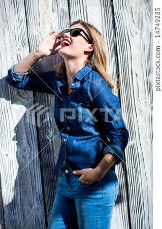 Pretty woman with hands in pocket Pretty woman with hands in pocket 14749285